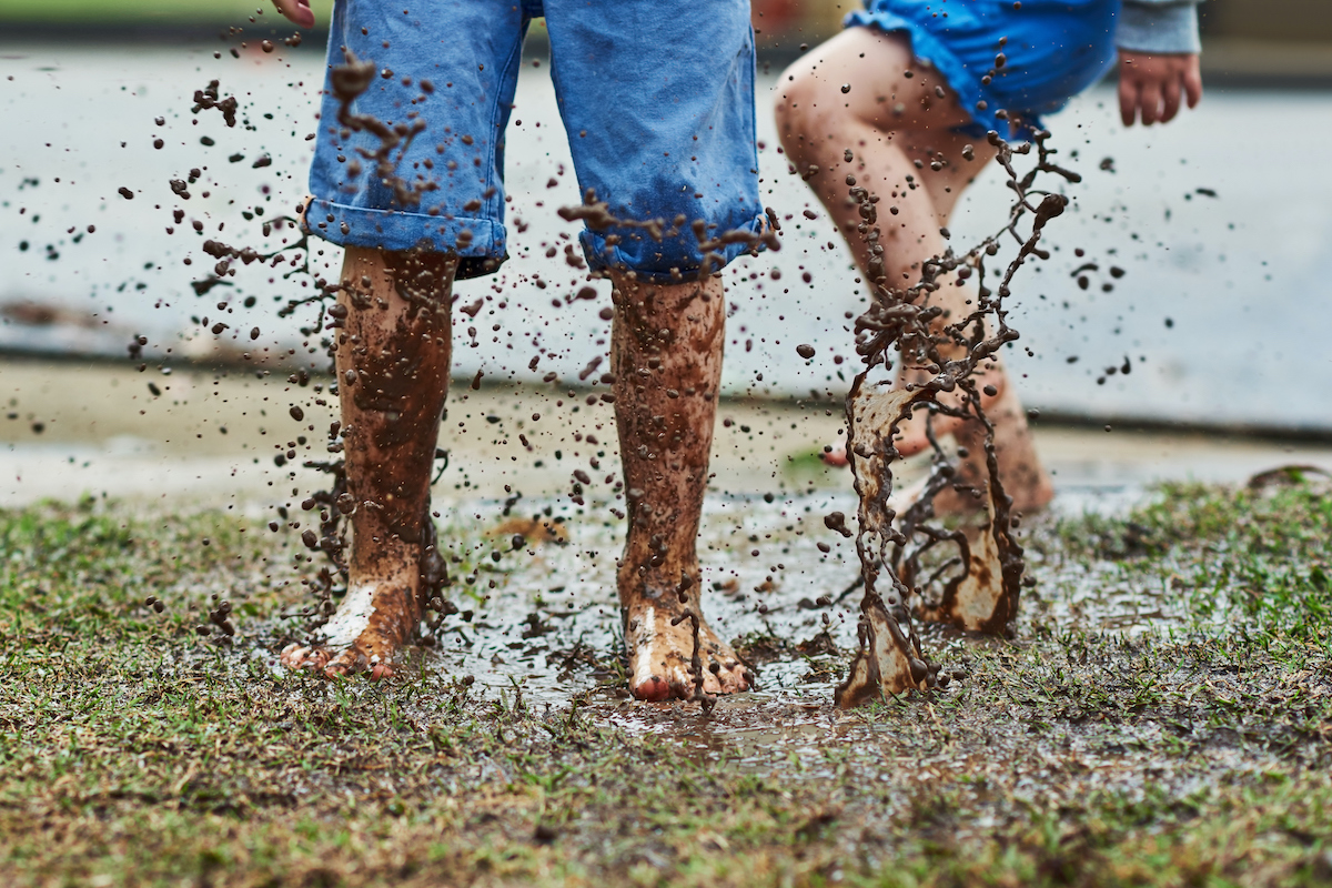 Muddy Kids Playing Outside