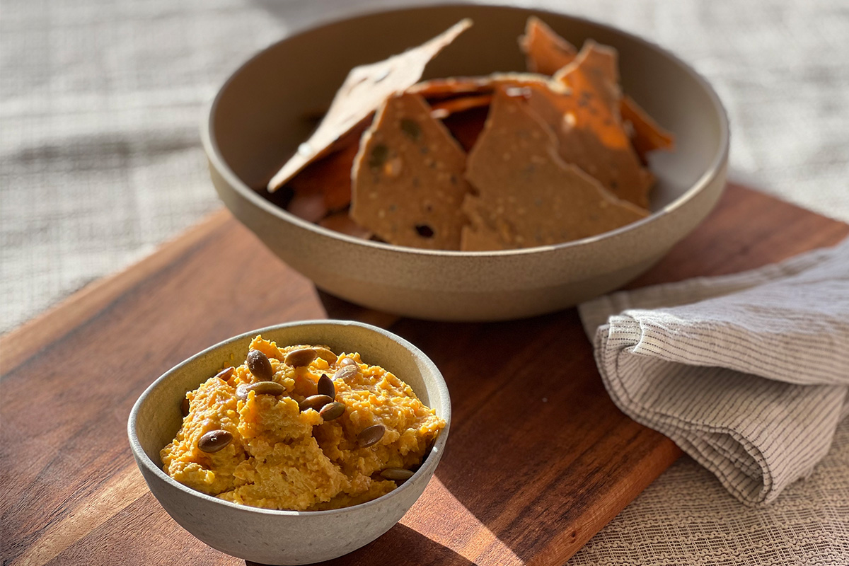 Honey roasted carrot hummus with seeded buckwheat crackers